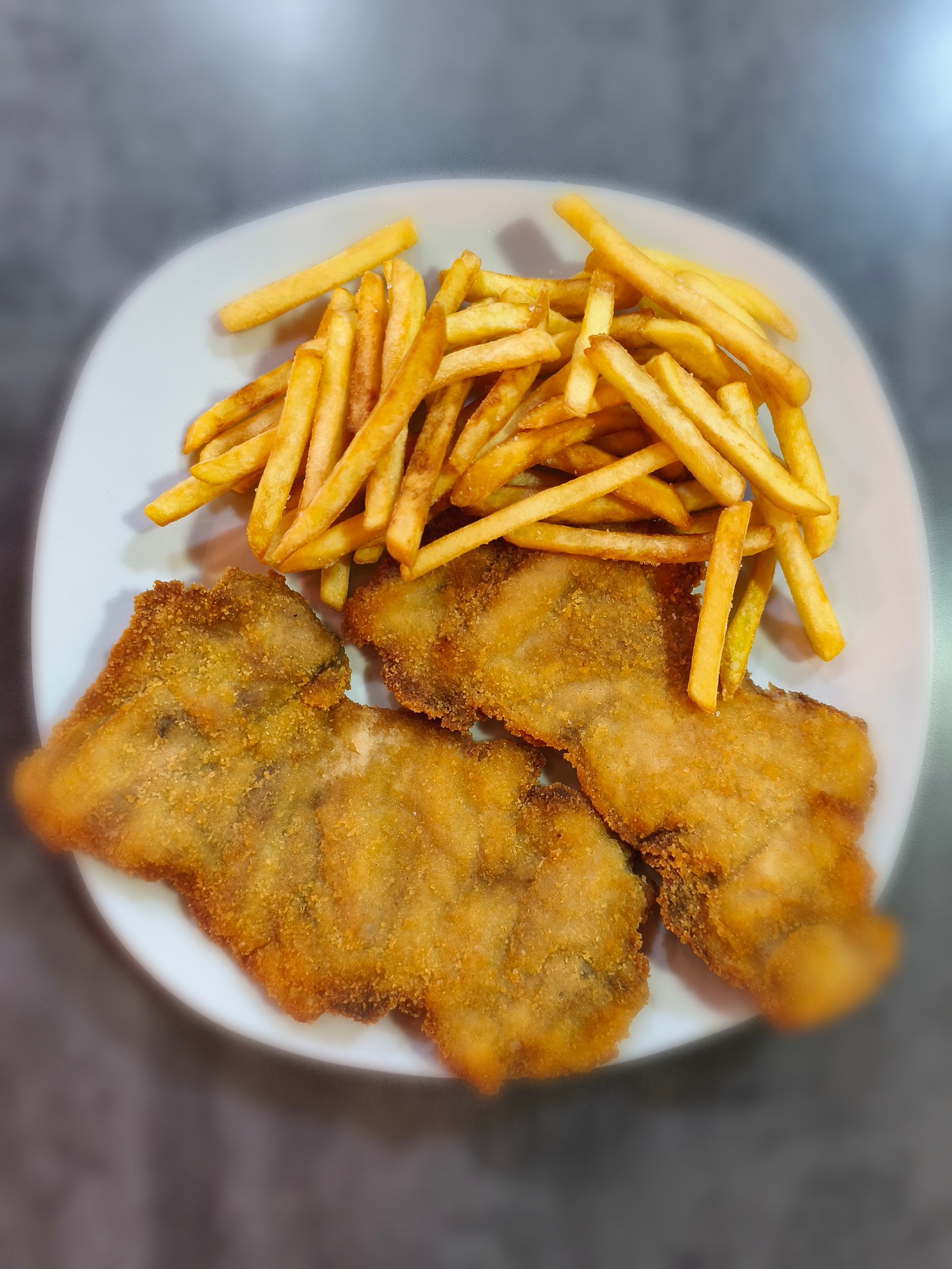 Milanesa de Muslo de Pollo con patatas